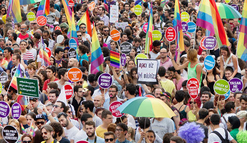 People attending a LGBT pride parade on June 30, 2013 in Taksim Square, Istanbul, Turkey.